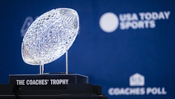 Jan 24, 2025; Columbus, OH, USA;  The AFCA Coaches' Trophy sits on display at the Ohio Union on Ohio State University's campus. The Buckeyes football team will be presented with the trophy on Sunday as winners of the USA TODAY Sports and the American Football Coaches Association 2024 US LBM Coaches Poll. Mandatory Credit: Adam Cairns-USA TODAY Network via Imagn Images