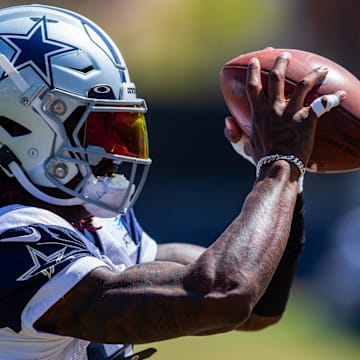 Dallas Cowboys wide receiver CeeDee Lamb makes a catch during training camp at Marriott Residence Inn-River Ridge playing fields.