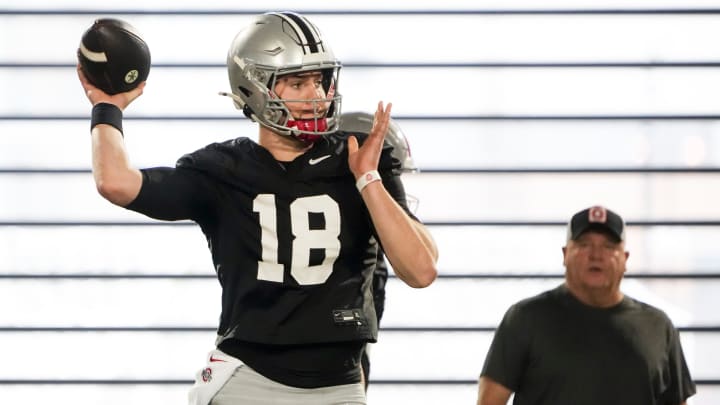 Mar 7, 2024; Columbus, OH, USA; Ohio State Buckeyes offensive coordinator Chip Kelly watches quarterback Will Howard (18) throw during spring football practice at the Woody Hayes Athletic Center.