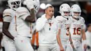 Texas Longhorns head coach Steve Sarkisian leads warm ups prior to the Cotton Bowl Classic College Football Playoff semifinal game between the Ohio State Buckeyes and the Texas Longhorns at AT&T Stadium in Arlington, Texas on Jan. 10, 2025.