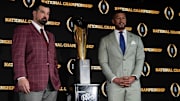 Ohio State coach Ryan Day and Notre Dame coach Marcus Freeman pose together before their College Football Playoff championship matchup.
