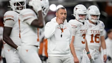 Texas Longhorns head coach Steve Sarkisian leads warm ups prior to the Cotton Bowl Classic College Football Playoff semifinal game between the Ohio State Buckeyes and the Texas Longhorns at AT&T Stadium in Arlington, Texas on Jan. 10, 2025.