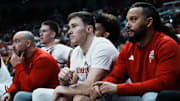 Louisville guard Reyne Smith (6) watched the game from the bench against California at the KFC Yum! Center in Louisville, Ky. on Mar. 5, 2025. Smith had to leave the game with an injury.