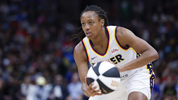 Jun 7, 2025; Chicago, Illinois, USA; Indiana Fever guard Kelsey Mitchell (0) looks to pass the ball against the Chicago Sky during the first half of a WNBA game at United Center. Mandatory Credit: Kamil Krzaczynski-Imagn Images