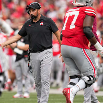 Aug 31, 2024; Columbus, OH, USA; Ohio State Buckeyes head coach Ryan Day walks onto the field during the NCAA football game against the Akron Zips at Ohio Stadium. Ohio State won 52-6.