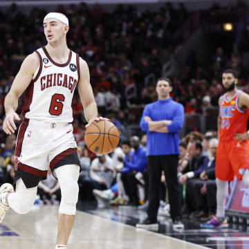 Jan 13, 2023; Chicago, Illinois, USA; Chicago Bulls guard Alex Caruso (6) brings the ball up court against the Oklahoma City Thunder during the first half at United Center. Mandatory Credit: Kamil Krzaczynski-USA TODAY Sports