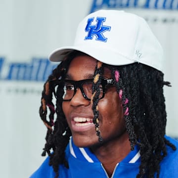 Jasper Johnson, a Lexington native and one of the top basketball players in the 2025 high school class, announces his commitment to the University of Kentucky during a ceremony at the Woodford County High School in Versailles, Ky. on Sep. 5, 2024.