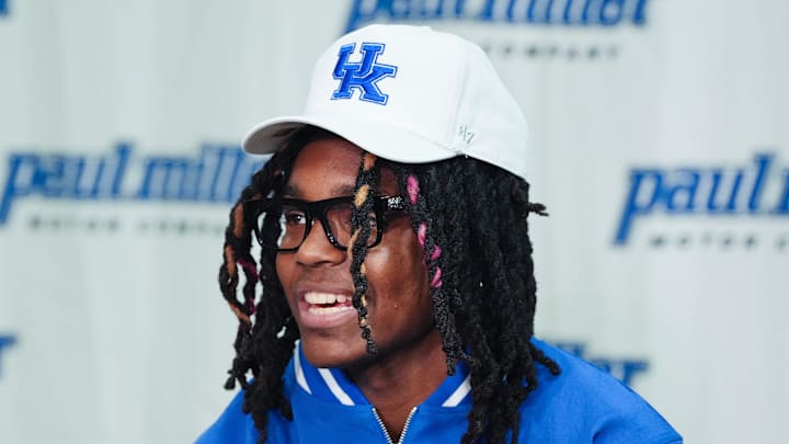 Jasper Johnson, a Lexington native and one of the top basketball players in the 2025 high school class, announces his commitment to the University of Kentucky during a ceremony at the Woodford County High School in Versailles, Ky. on Sep. 5, 2024.