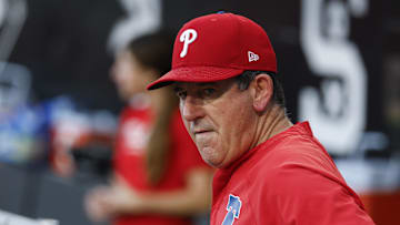 Jul 28, 2025; Chicago, Illinois, USA; Philadelphia Phillies manager Rob Thomson (59) looks on from the dugout before a baseball game against the Chicago White Sox at Rate Field.