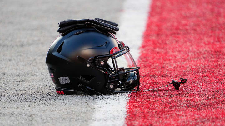 Sep 24, 2022; Columbus, Ohio, USA; A black helmet sits on the sideline as part of the special uniform the Ohio State Buckeyes will wear in the NCAA Division I football game against the Wisconsin Badgers at Ohio Stadium. Mandatory Credit: Adam Cairns-The Columbus Dispatch

Ncaa Football Wisconsin Badgers At Ohio State Buckeyes