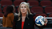 Louisville head coach Dani Busboom Kelly helps her team warm up ahead of their Final Four match against Pittsburgh at the KFC Yum! Center in Louisville, Ky. on Dec. 19, 2024.