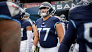 Tennessee Titans offensive tackle Peter Skoronski (77) heads out for warm ups before a game against the Carolina Panthers at Nissan Stadium in Nashville, Tenn., Sunday, Nov. 26, 2023.