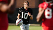 Aug 1, 2024; Columbus, OH, USA; Ohio State Buckeyes quarterback Julian Sayin (10) runs between drills during football camp at the Woody Hayes Athletic Complex.