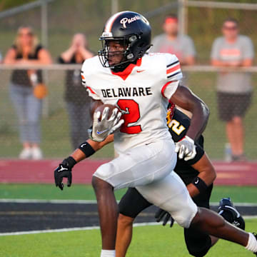 Sep 13, 2024; Sunbury, Ohio, USA; Delaware Hayes Favour Akih (2) runs the ball in for a touchdown against Big Walnut in the first half at Big Walnut High School.