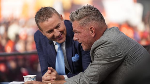Pat McAfee, right, talks to Kirk Herbstreit on the set of ESPN College GameDay prior to the NCAA football game between the Oh