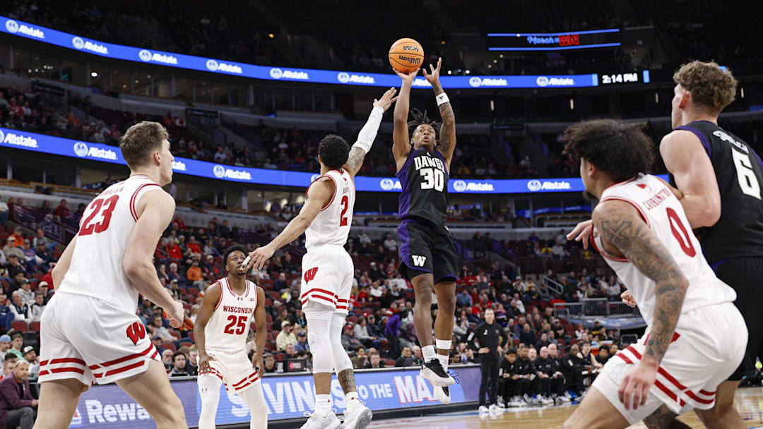 Mar 12, 2026; Chicago, IL, USA; Washington Huskies guard Courtland Muldrew (30) shoots against the Wisconsin Badgers during the first half at United Center. Mandatory Credit: Kamil Krzaczynski-Imagn Images