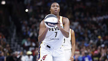 Jun 7, 2025; Chicago, Illinois, USA; Indiana Fever forward Aliyah Boston (7) shoots a free throw against the Chicago Sky during the first half of a WNBA game at United Center. Mandatory Credit: Kamil Krzaczynski-Imagn Images
