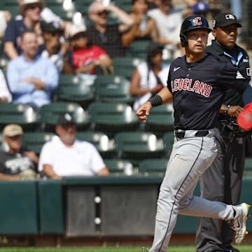 Sep 11, 2024; Chicago, Illinois, USA; Cleveland Guardians outfielder Steven Kwan (38) scores against the Chicago White Sox during the third inning at Guaranteed Rate Field.