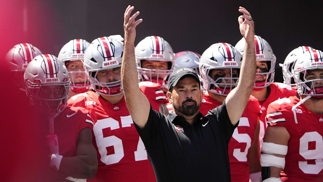 Ohio State Buckeyes head coach Ryan Day leads his team onto the field prior to the NCAA football game against the Texas Longhorns at Ohio Stadium on Aug. 30, 2025.