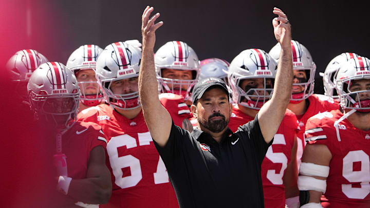Ohio State Buckeyes head coach Ryan Day leads his team onto the field prior to the NCAA football game against the Texas Longhorns at Ohio Stadium on Aug. 30, 2025.