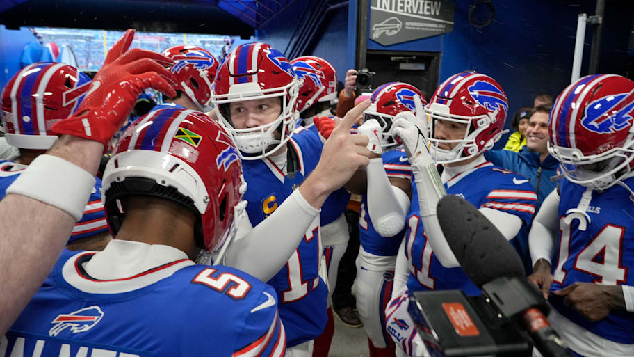 Bills quarterback Josh Allen huddles up the offense in the players tunnel before a game against the Jets.