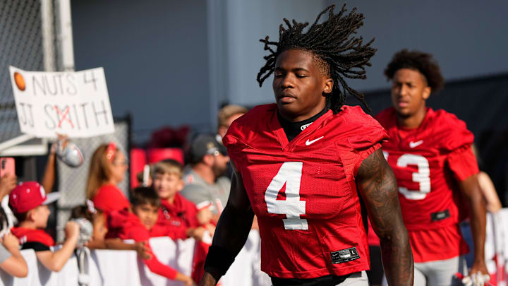 Ohio State Buckeyes wide receiver Jeremiah Smith (4) takes the field for football training camp