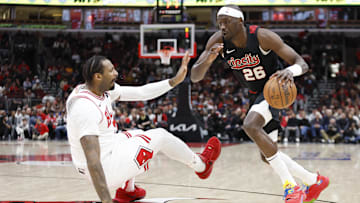 Mar 18, 2024; Chicago, Illinois, USA; Portland Trail Blazers center Duop Reath (26) drives to the basket against the Chicago Bulls during the second half at United Center. Mandatory Credit: Kamil Krzaczynski-Imagn Images