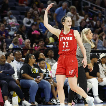 Indiana Fever guard Caitlin Clark (22) reacts as she walks off the floor during the second half of a basketball game