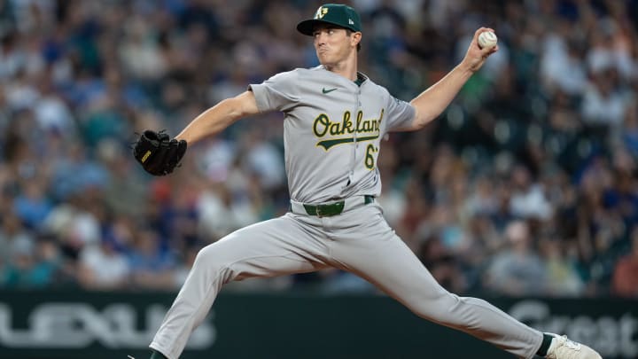 May 10, 2024; Seattle, Washington, USA; Oakland Athletics reliever Easton Lucas (67) delivers a pitch against the Seattle Mariners at T-Mobile Park.