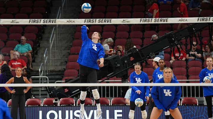 Kentucky volleyball and Nebraska volleyball warm up ahead of their match in the AVCA First Serve Showcase at the KFC Yum! Center in Louisville, Ky. on Aug. 27, 2024