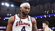 Nov 19, 2025; Chicago, Illinois, USA; Illinois Fighting Illini guard Kylan Boswell (4) reacts during the first half at United Center. Mandatory Credit: Kamil Krzaczynski-Imagn Images