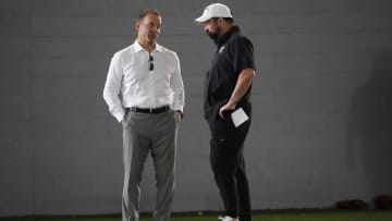 Mar 5, 2024; Columbus, OH, USA; Ohio State Buckeyes head coach Ryan Day talks to incoming athletic director Ross Bjork during the first spring practice at the Woody Hayes Athletic Center.