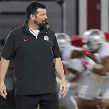 Mar 7, 2024; Columbus, OH, USA; Ohio State Buckeyes head coach Ryan Day watches players run during spring football practice at the Woody Hayes Athletic Center.