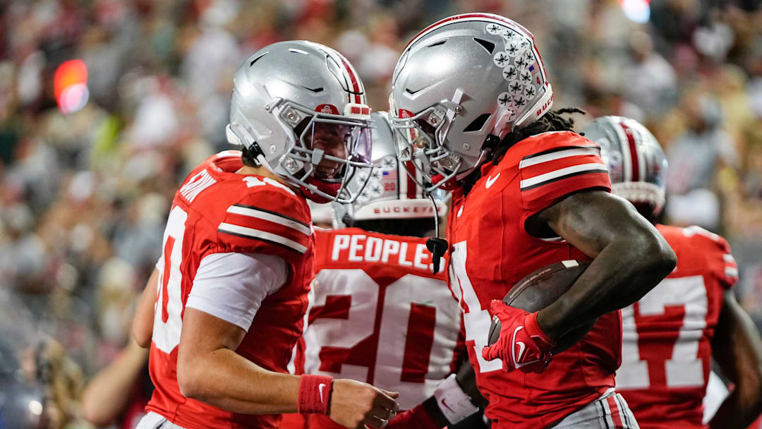 Ohio State Buckeyes quarterback Julian Sayin (10) celebrates a touchdown by wide receiver Jeremiah Smith (4) during the second half of the NCAA football game against the Ohio Bobcats at Ohio Stadium on Sept. 13, 2025. Ohio State won 37-9.