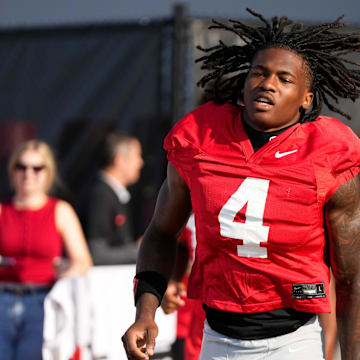 Ohio State Buckeyes wide receiver Jeremiah Smith (4) takes the field for football training camp at the Woody Hayes Athletic Center on Aug. 1, 2025.