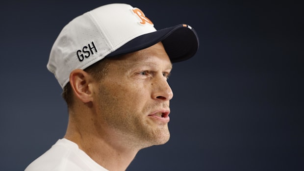Chicago Bears head coach Ben Johnson speaks during training camp at Halas Hall.