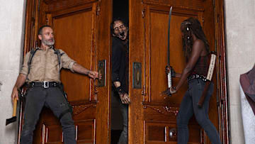 Andrew Lincoln as Rick Grimes and Danai Gurira as Michonne in The Walking Dead season 9