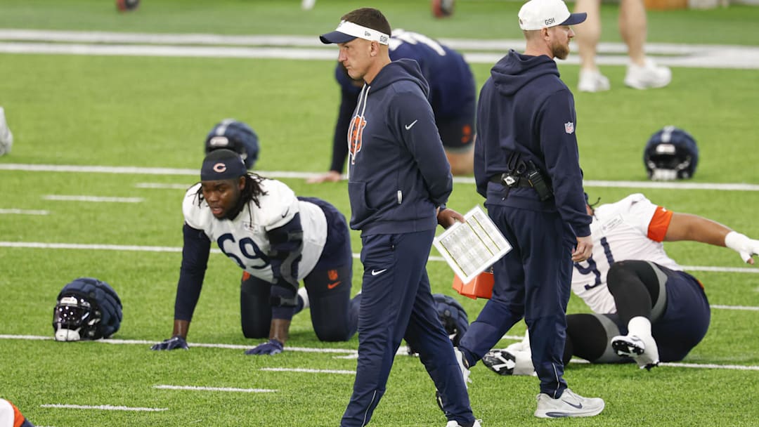 May 8, 2026; Lake Forest, IL, USA; Chicago Bears defensive coordinator Dennis Allen walks on the field during Rookie Minicamp at Halas Hall.