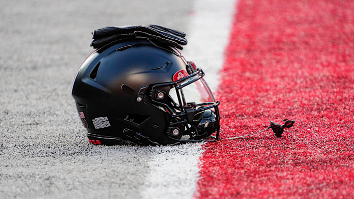 Sep 24, 2022; Columbus, Ohio, USA; A black helmet sits on the sideline as part of the special uniform the Ohio State Buckeyes will wear in the NCAA Division I football game against the Wisconsin Badgers at Ohio Stadium. Mandatory Credit: Adam Cairns-The Columbus Dispatch

Ncaa Football Wisconsin Badgers At Ohio State Buckeyes