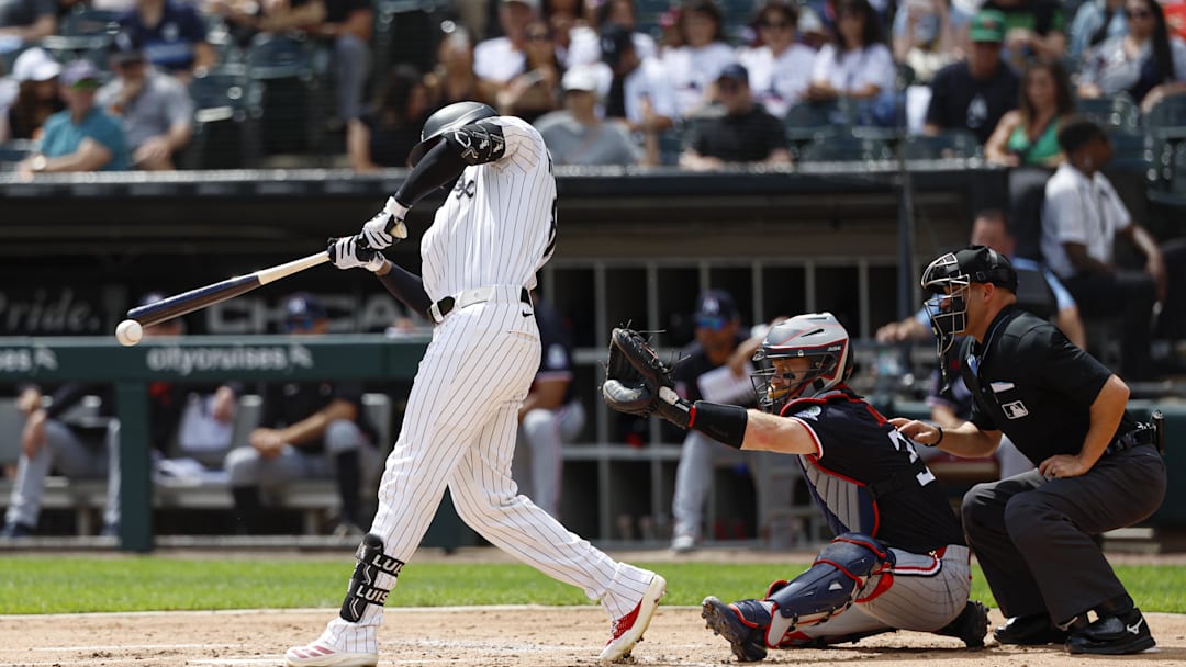Aug 24, 2025; Chicago, Illinois, USA; Chicago White Sox center fielder Luis Robert Jr. (88) singles against the Minnesota Twins during the first inning at Rate Field. Mandatory Credit: Kamil Krzaczynski-Imagn Images