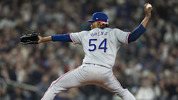 Jun 14, 2024; Seattle, Washington, USA; Texas Rangers reliever Jose Urena (54) delivers a pitch during the fifth inning against the Seattle Mariners at T-Mobile Park. Mandatory Credit: Stephen Brashear-Imagn Images