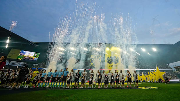 MLS and Liga MX players stand for the National Anthem during the MLS All-Star Game at Lower.com Field.