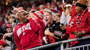 Fans react after Ohio State Buckeyes wide receiver Jeremiah Smith (4) makes a one-handed catch in front of UCLA Bruins defensive back Andre Jordan Jr. (2) during the NCAA football game at Ohio Stadium in Columbus on Nov. 15, 2025.