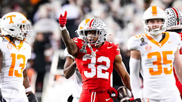 Ohio State running back TreVeyon Henderson (32) celebrates in the first half at Ohio Stadium on Saturday, Dec. 21, 2024 in Columbus, Ohio.