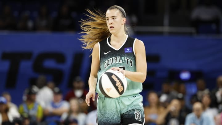 Jun 4, 2024; Chicago, Illinois, USA; New York Liberty guard Sabrina Ionescu (20) brings the ball up court against the Chicago Sky during the first half of a WNBA game at Wintrust Arena. Mandatory Credit: Kamil Krzaczynski-USA TODAY Sports