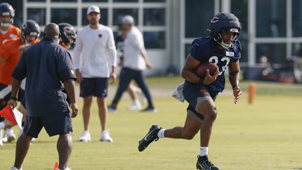 Chicago Bears running back Roschon Johnson (23) runs with the ball during training camp