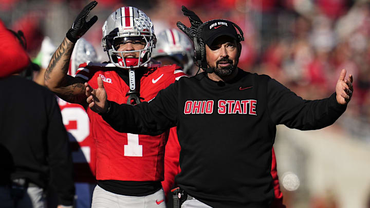 Ohio State Buckeyes head coach Ryan Day and wide receiver Brandon Inniss (1) react during the second half of the NCAA football game against the Rutgers Scarlet Knights at Ohio Stadium in Columbus on Nov. 22, 2025. Ohio State won 42-9.