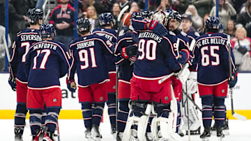 Jan 25, 2025; Columbus, Ohio, USA; Columbus Blue Jackets right wing Kirill Marchenko (86) hugs goaltender Elvis Merzlikins (90) after defeating Los Angeles Kings in overtime at Nationwide Arena on Saturday, Jan. 25, 2025 in Columbus, Ohio.   Mandatory Credit: Samantha Madar/USA TODAY Network via Imagn Images 
