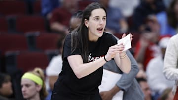 Jun 7, 2025; Chicago, Illinois, USA; Indiana Fever guard Caitlin Clark (22) applauds her teammates during the first half of a WNBA game against the Chicago Sky at United Center. Mandatory Credit: Kamil Krzaczynski-Imagn Images