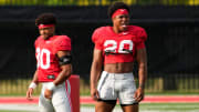 Aug 8, 2024; Columbus, Ohio, USA; Ohio State Buckeyes running back James Peoples (20) warms up during football practice at the Woody Hayes Athletic Complex.